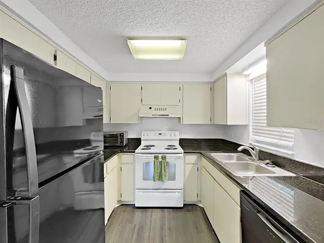 $239,900 | 2690 Coral Landings Boulevard, Unit 218, Palm Harbor, FL 34684