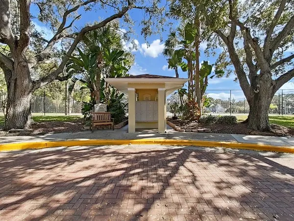 a swimming pool with wooden fence