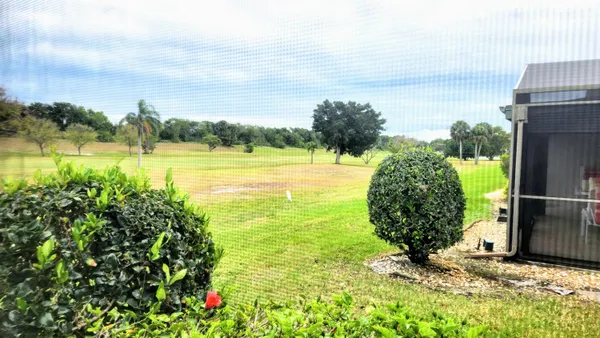 a view of a lake with a big yard