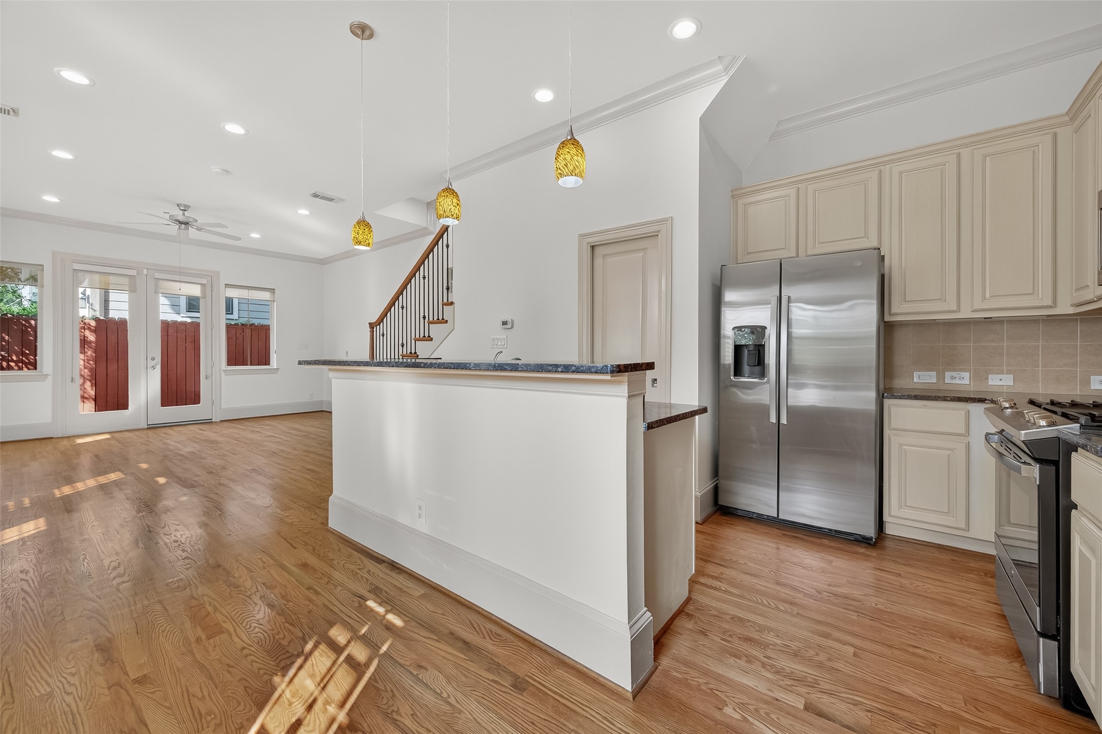 931 West 23rd Street, Unit K Houston, TX 77008 - Photo 9 of 40 The open-concept layout that seamlessly connects the kitchen, dining, and living areas with a thoughtful flow creates an ideal setting for everyday living and effortless entertaining.