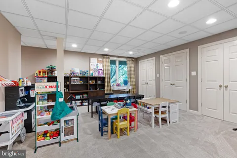 a room with lots of furniture and clutter