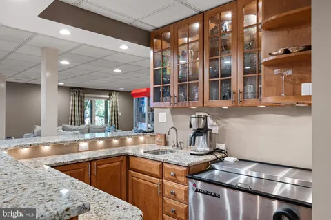 a bedroom with a bed and a lamp