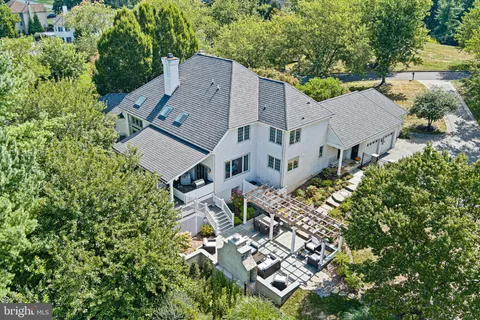 an aerial view of a house with a garden