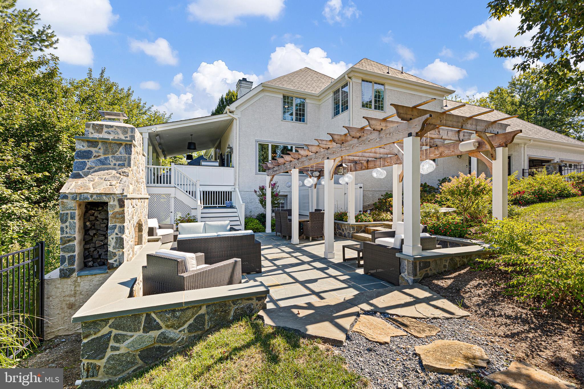 9 Pheasants Ridge South Wilmington, DE 19807 - Photo 49 of 53 a view of a house with backyard water fountain and sitting area