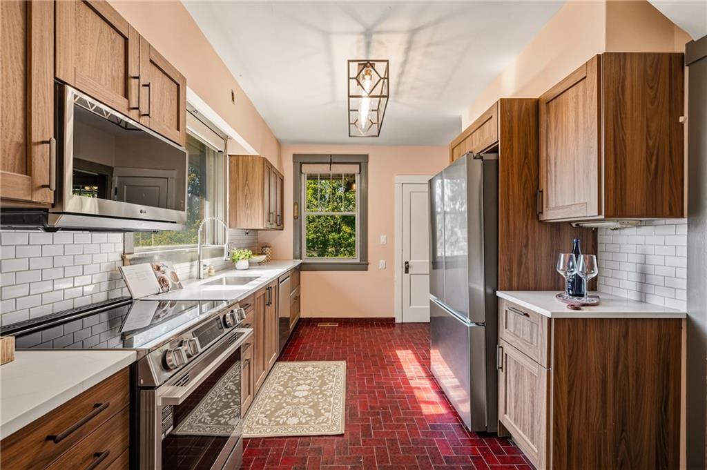 Stainless-steel appliances and timeless finishes