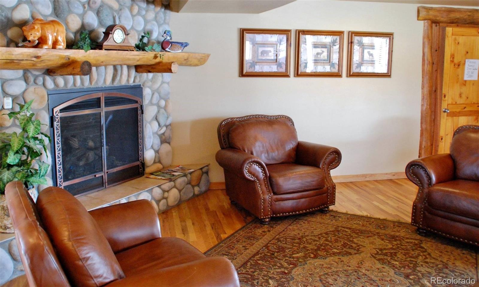 Sunshine Loop Fairplay, CO 80440 - Photo 8 of 13 a living room with furniture and a fireplace