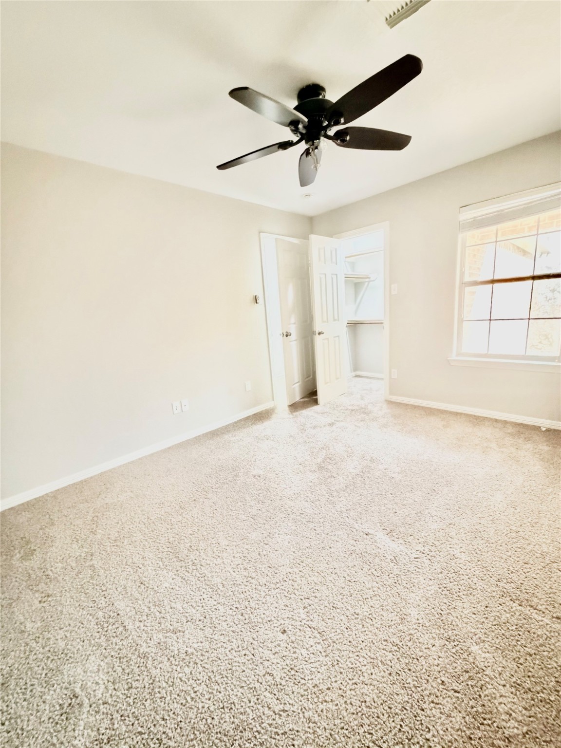 9110 Grandview Park Drive Spring, TX 77379 - Photo 12 of 28 an empty room with a empty space and a ceiling fan