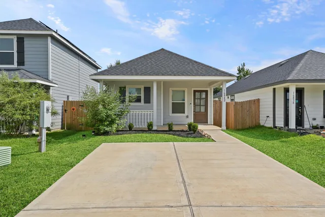 front view of a house and a yard