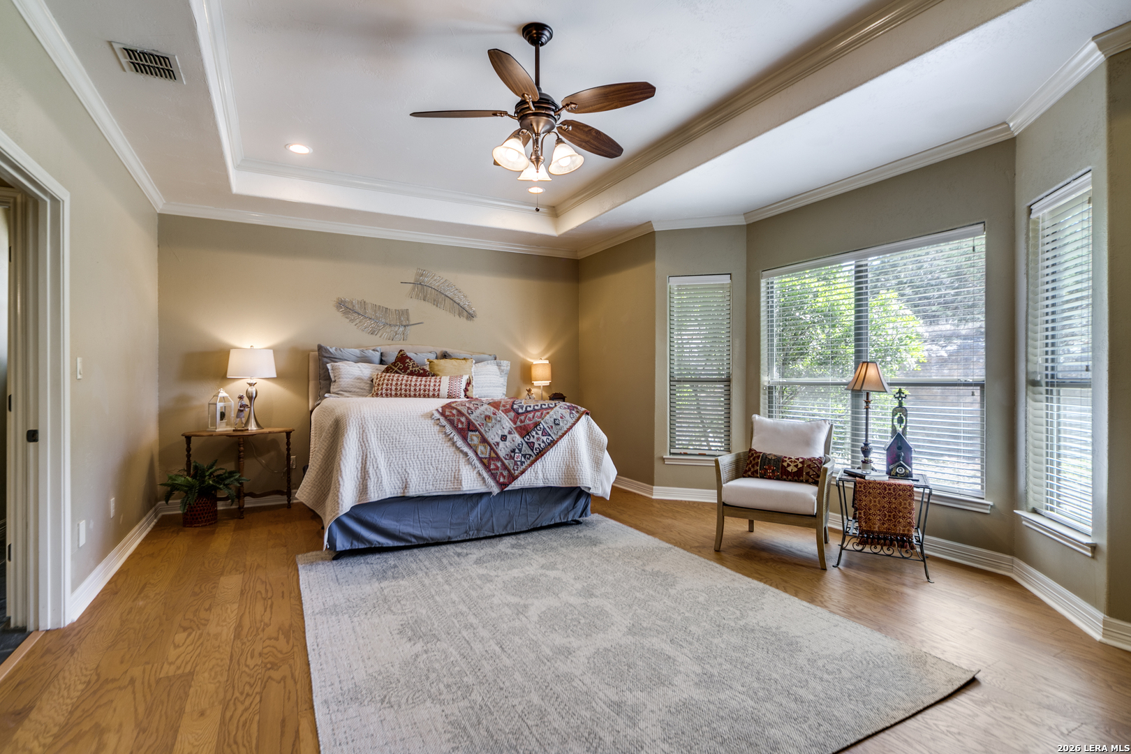 386 Wentworth Spring Branch, TX 78070 - Photo 12 of 30 a spacious bedroom with a bed and glass walk in closet