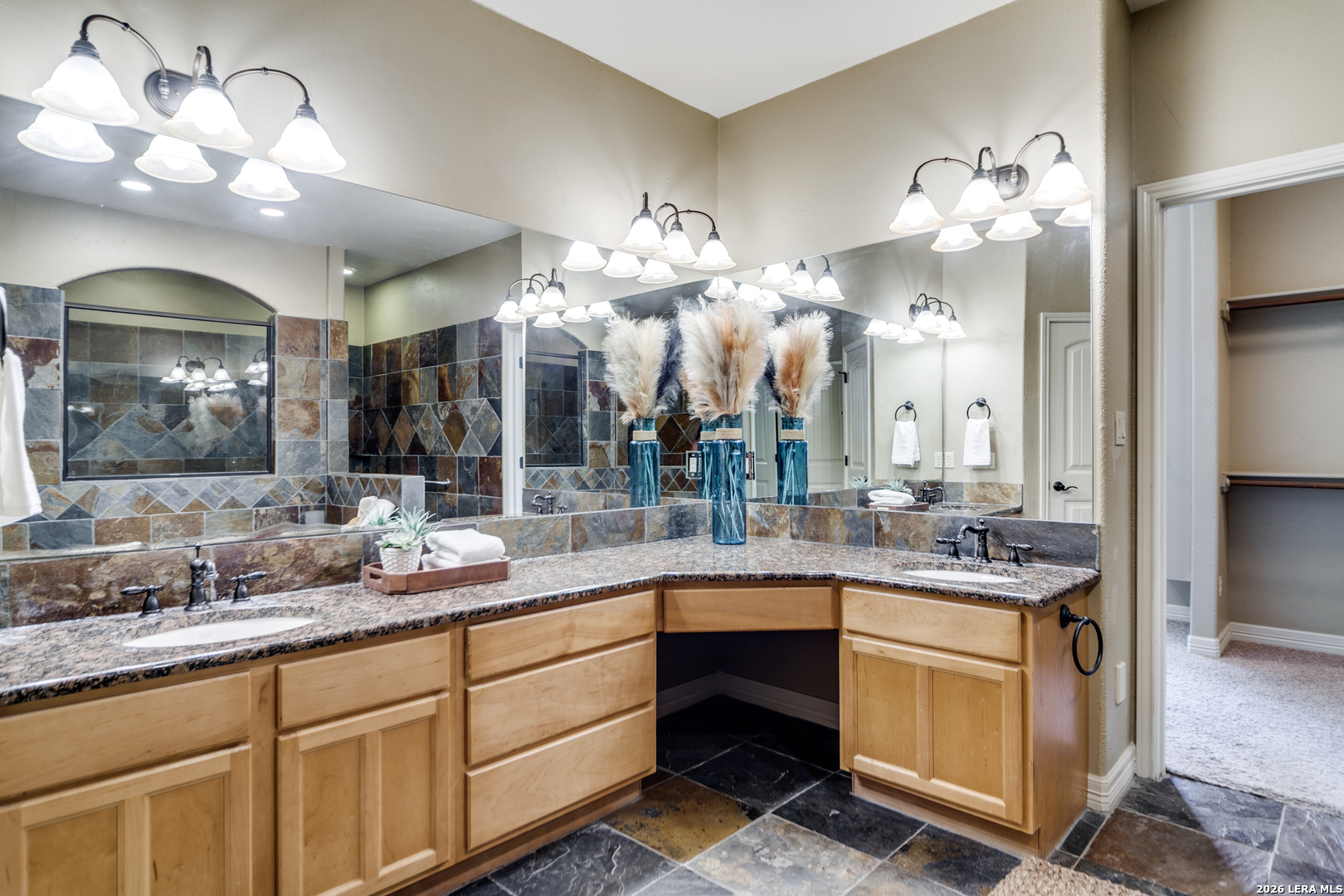 386 Wentworth Spring Branch, TX 78070 - Photo 15 of 30 a kitchen with a sink and chandelier