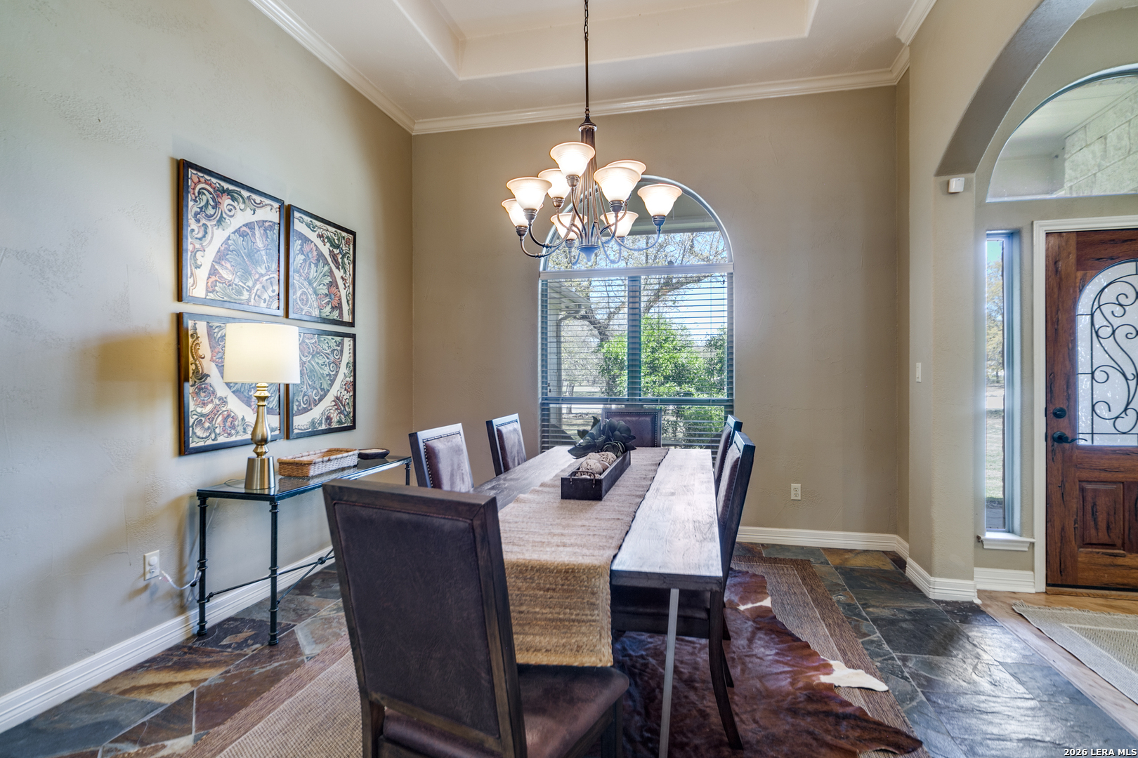 386 Wentworth Spring Branch, TX 78070 - Photo 6 of 30 a view of a dining room with furniture a chandelier and wooden floor