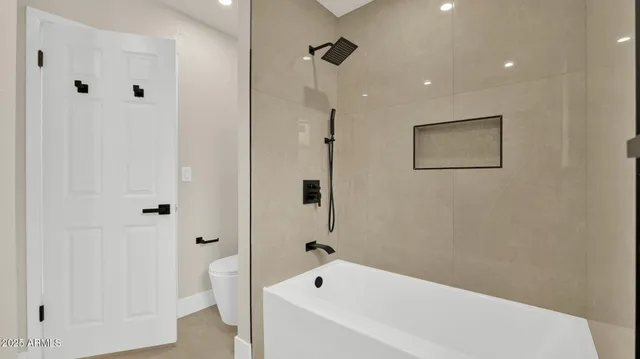 a bathroom with a white tub