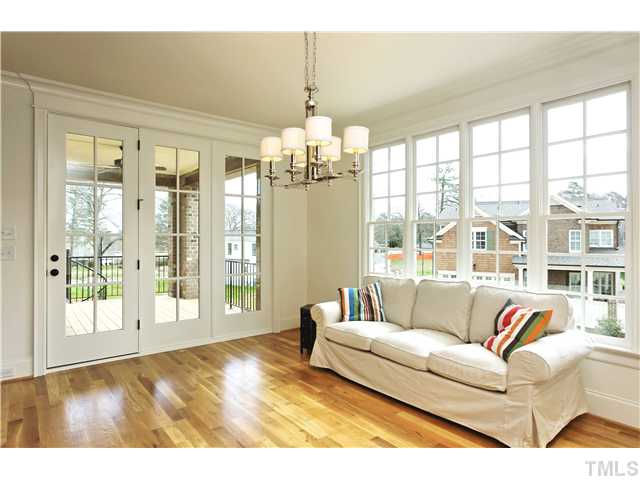 708 Wayne Drive Raleigh, NC 27608 - Photo 9 of 25 a living room with furniture and a large window