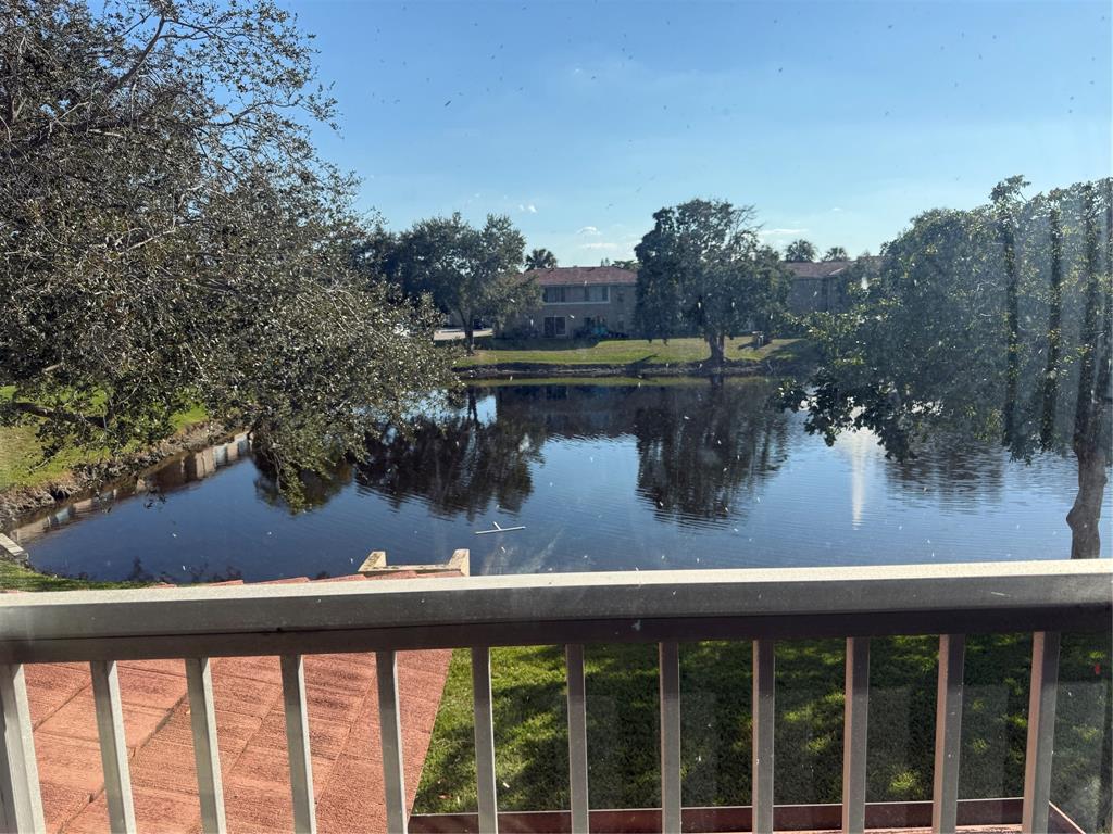 9930 Twin Lakes Drive, Unit 7L Coral Springs, FL 33071 - Photo 14 of 39 a view of swimming pool from a lake
