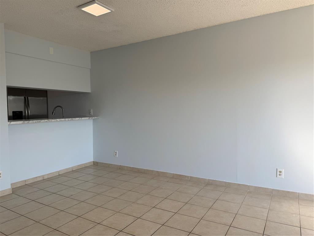 9930 Twin Lakes Drive, Unit 7L Coral Springs, FL 33071 - Photo 16 of 39 a view of a kitchen