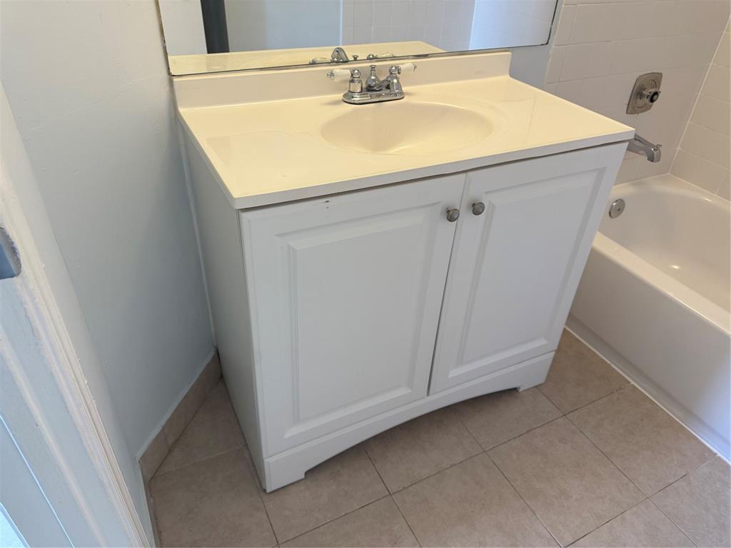 9930 Twin Lakes Drive, Unit 7L Coral Springs, FL 33071 - Photo 24 of 39 a utility room with a sink