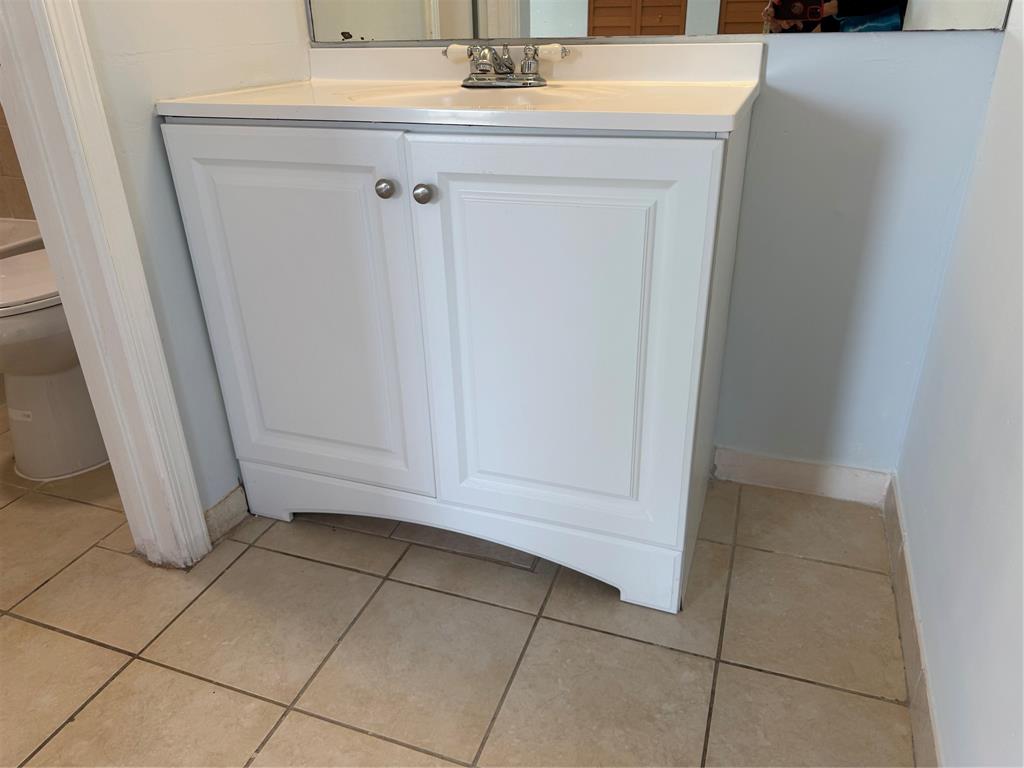 9930 Twin Lakes Drive, Unit 7L Coral Springs, FL 33071 - Photo 35 of 39 a view of a utility room with dishwasher door