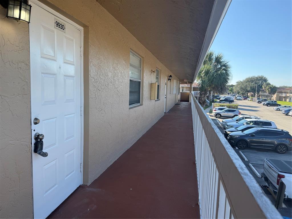 9930 Twin Lakes Drive, Unit 7L Coral Springs, FL 33071 - Photo 39 of 39 a view of a balcony