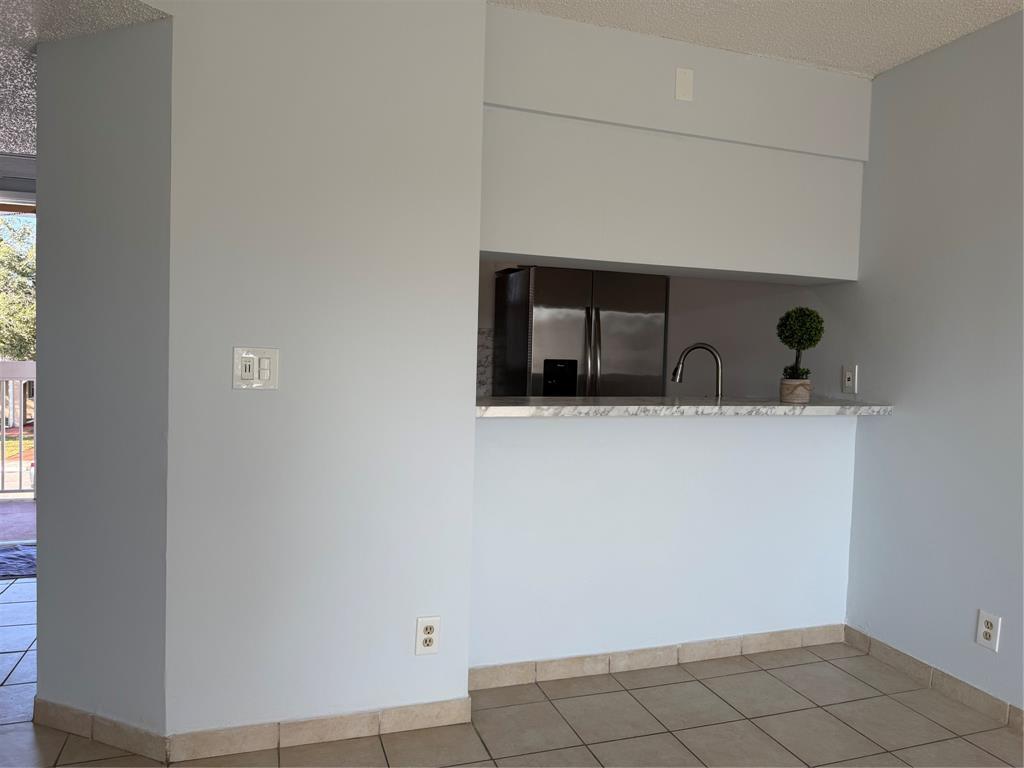 9930 Twin Lakes Drive, Unit 7L Coral Springs, FL 33071 - Photo 8 of 39 a bathroom with a sink and mirror