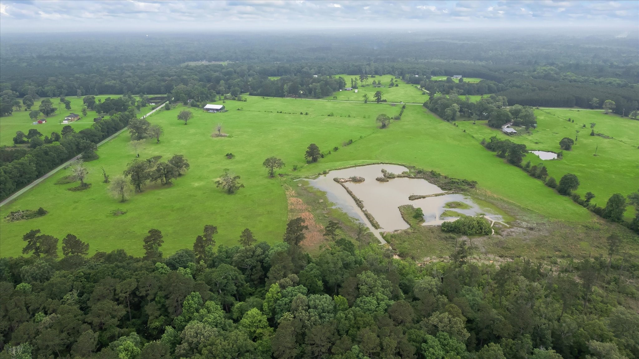 2760 Stringtown Road Shepherd, TX 77371 - Photo 17 of 46 a aerial view of a houses with yard