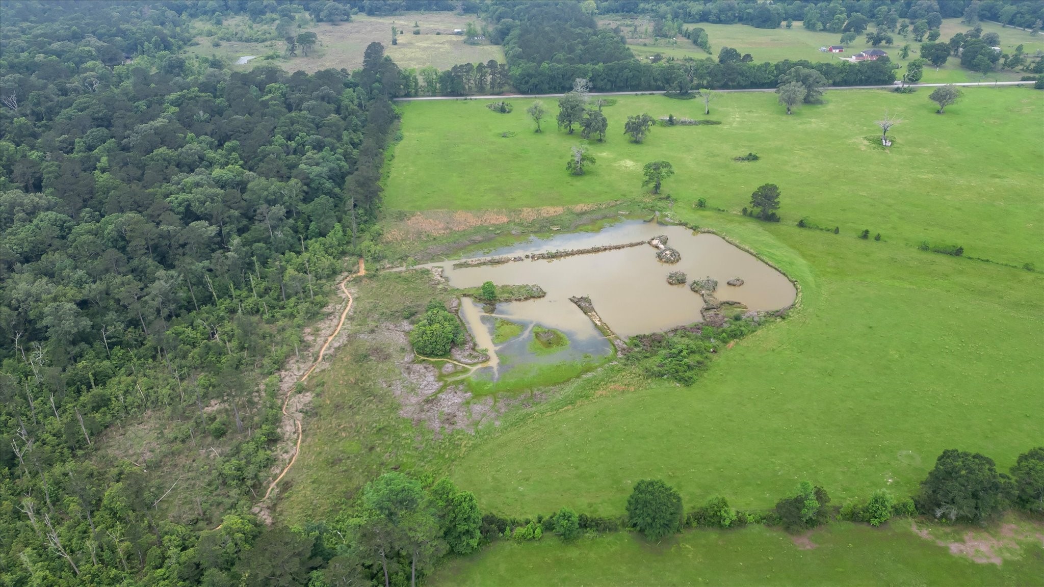 2760 Stringtown Road Shepherd, TX 77371 - Photo 24 of 46 an aerial view of a garden