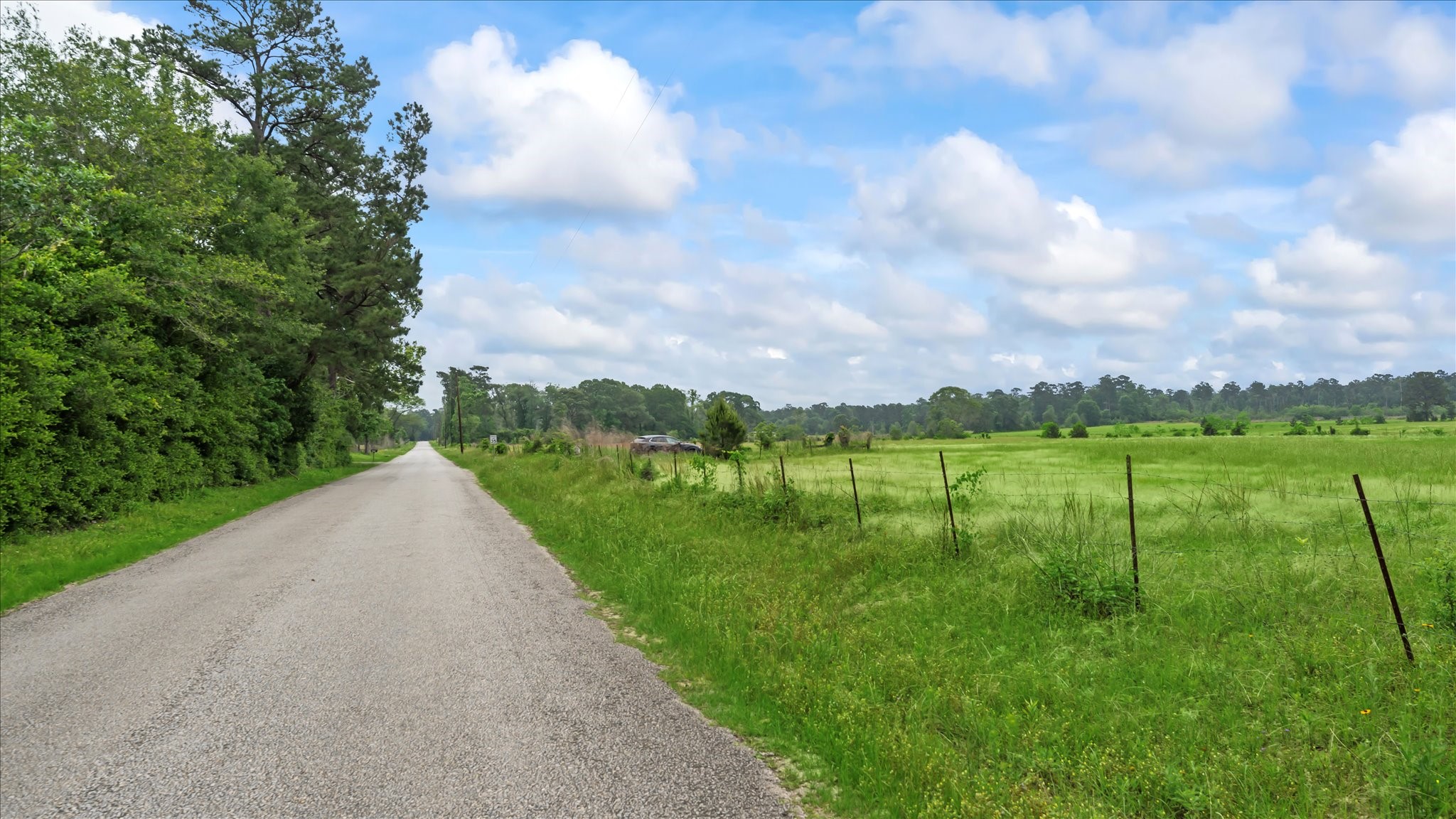 2760 Stringtown Road Shepherd, TX 77371 - Photo 4 of 46 a view of a lake with a yard
