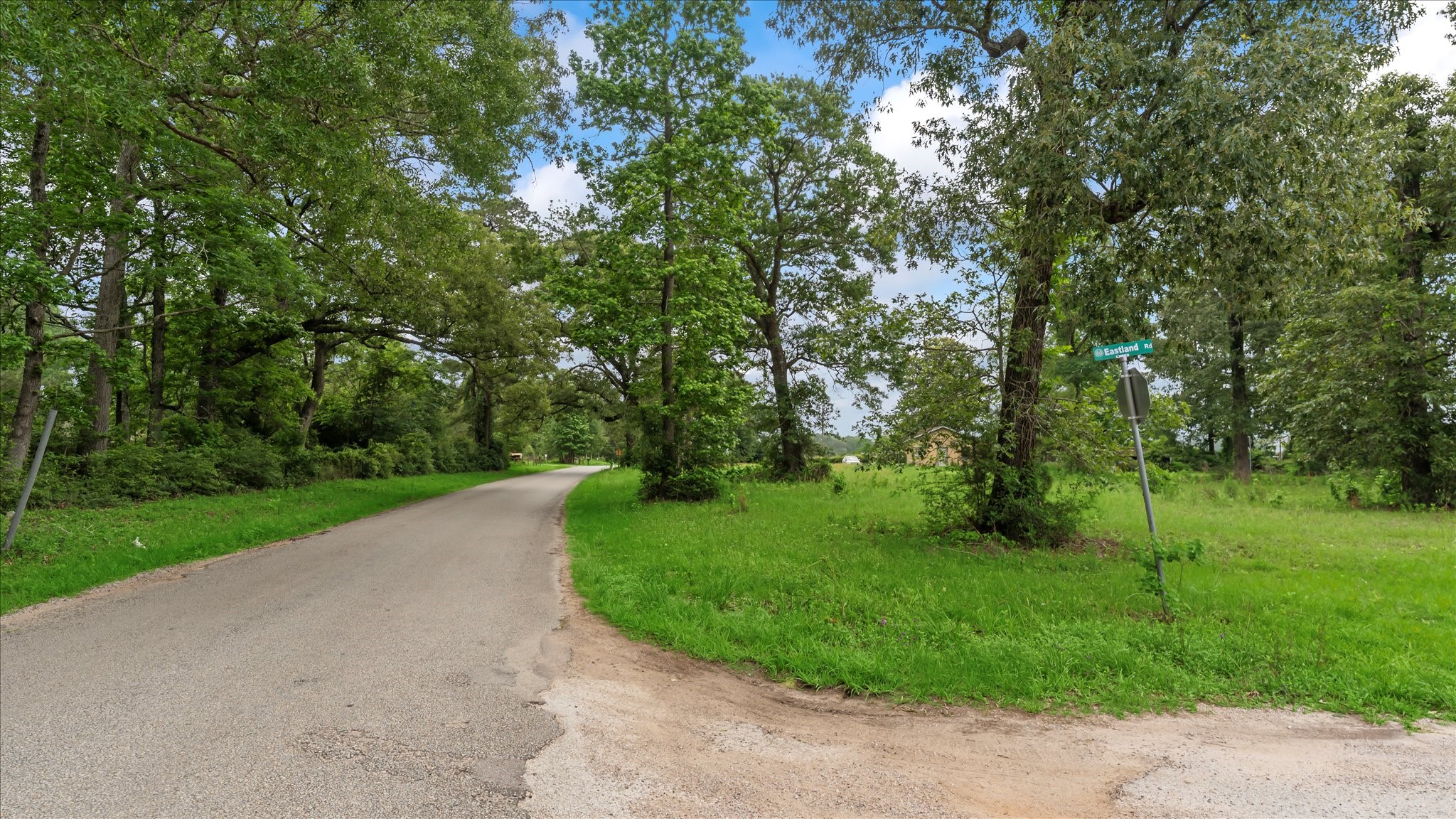 2760 Stringtown Road Shepherd, TX 77371 - Photo 42 of 46 a view of a street both of side forest