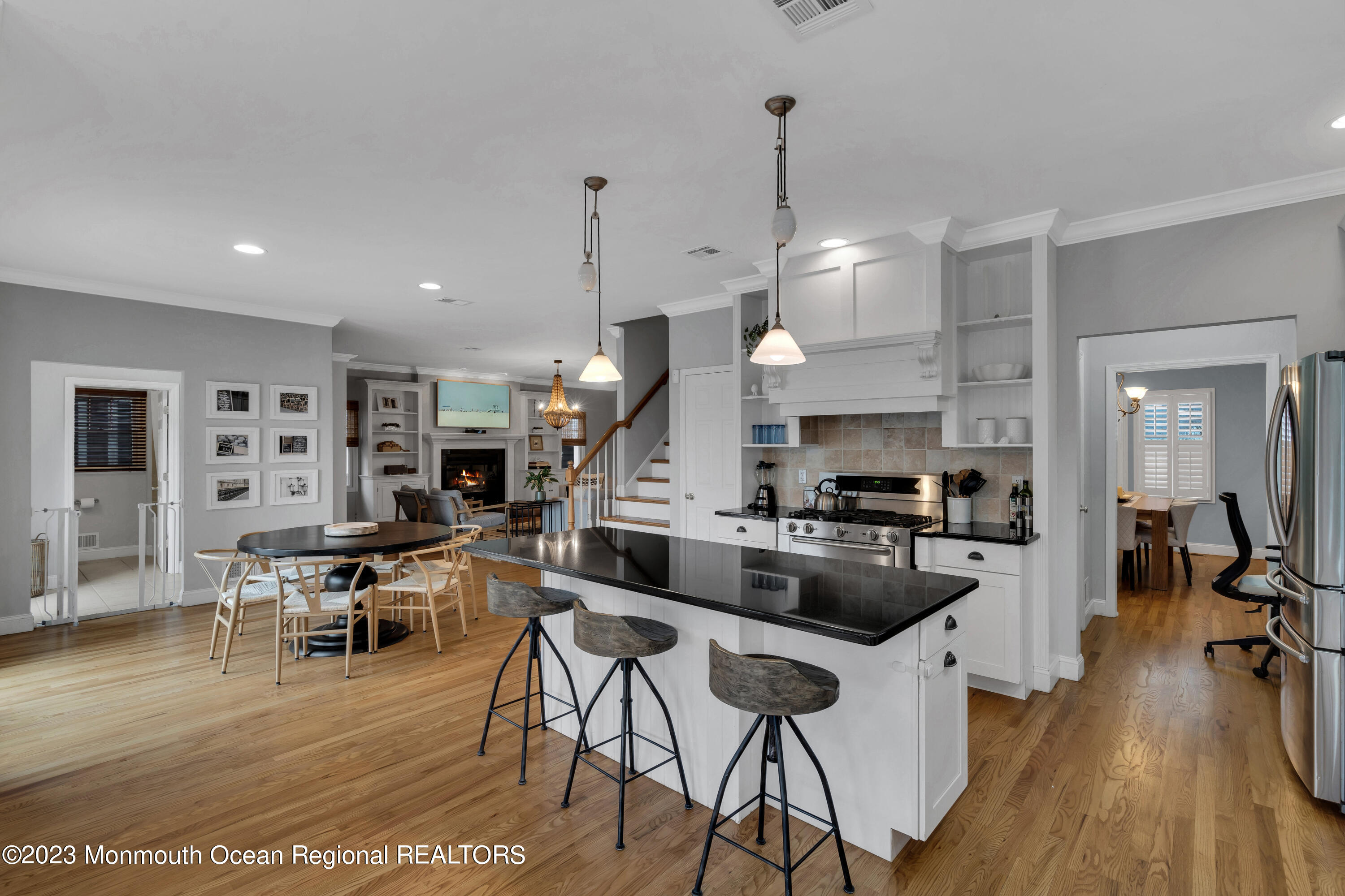 89 Mclean Avenue Manasquan, NJ 08736 - Photo 15 of 38 a large kitchen with a table and chairs
