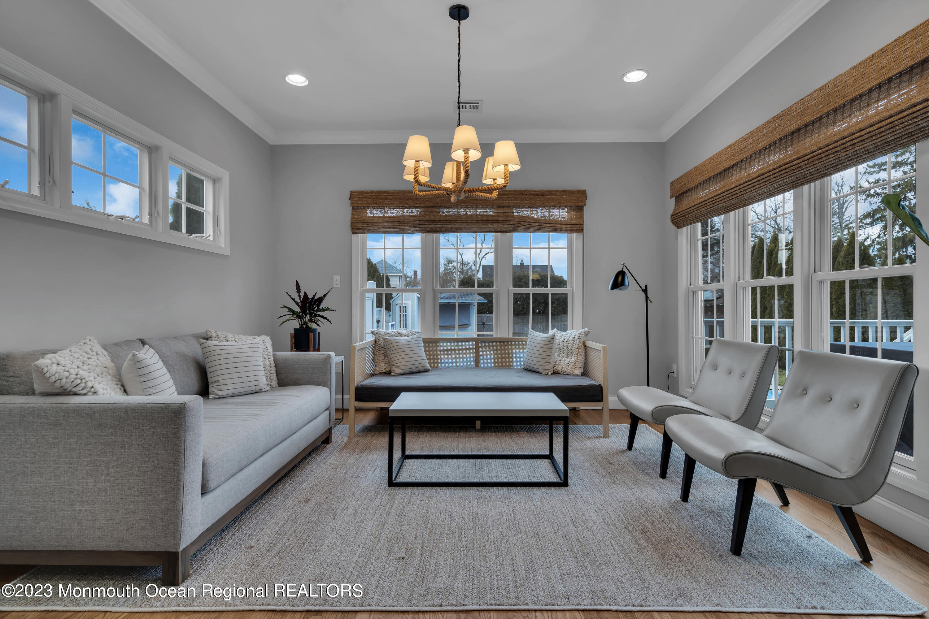 89 Mclean Avenue Manasquan, NJ 08736 - Photo 16 of 38 a living room with furniture and a large window