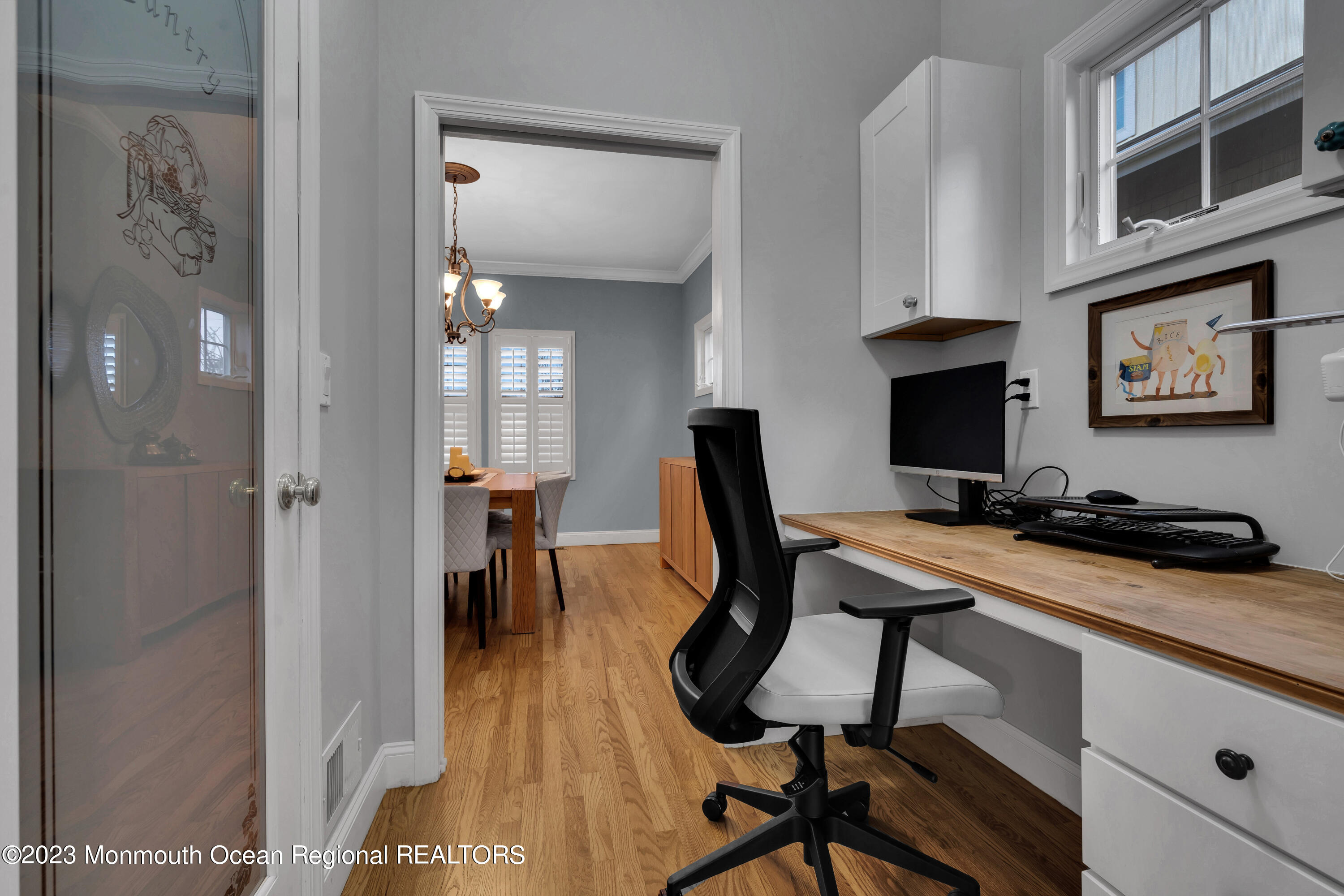 89 Mclean Avenue Manasquan, NJ 08736 - Photo 17 of 38 a view of a workspace with furniture and wooden floor