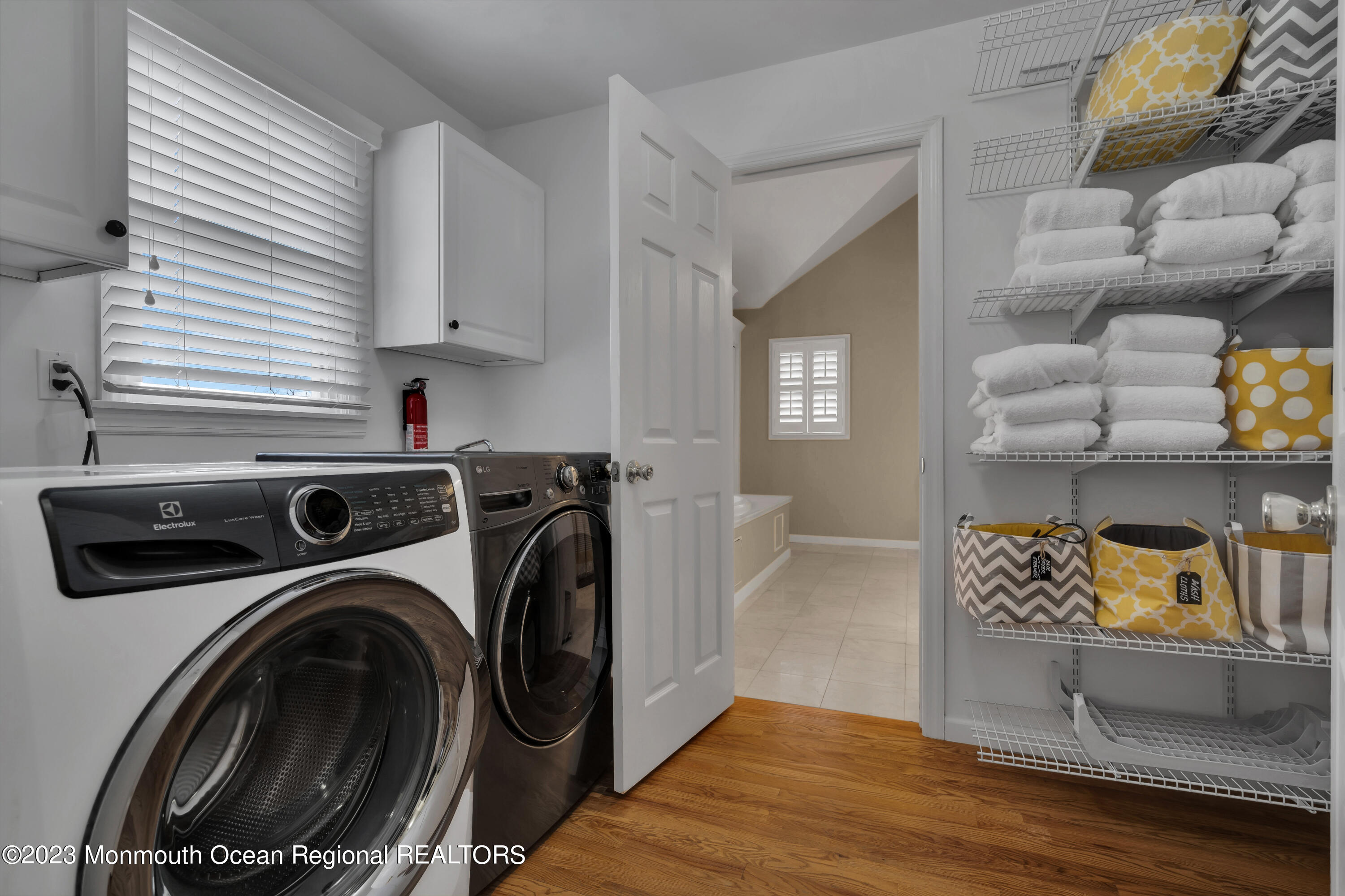 89 Mclean Avenue Manasquan, NJ 08736 - Photo 23 of 38 a view of kitchen and washer and dryer