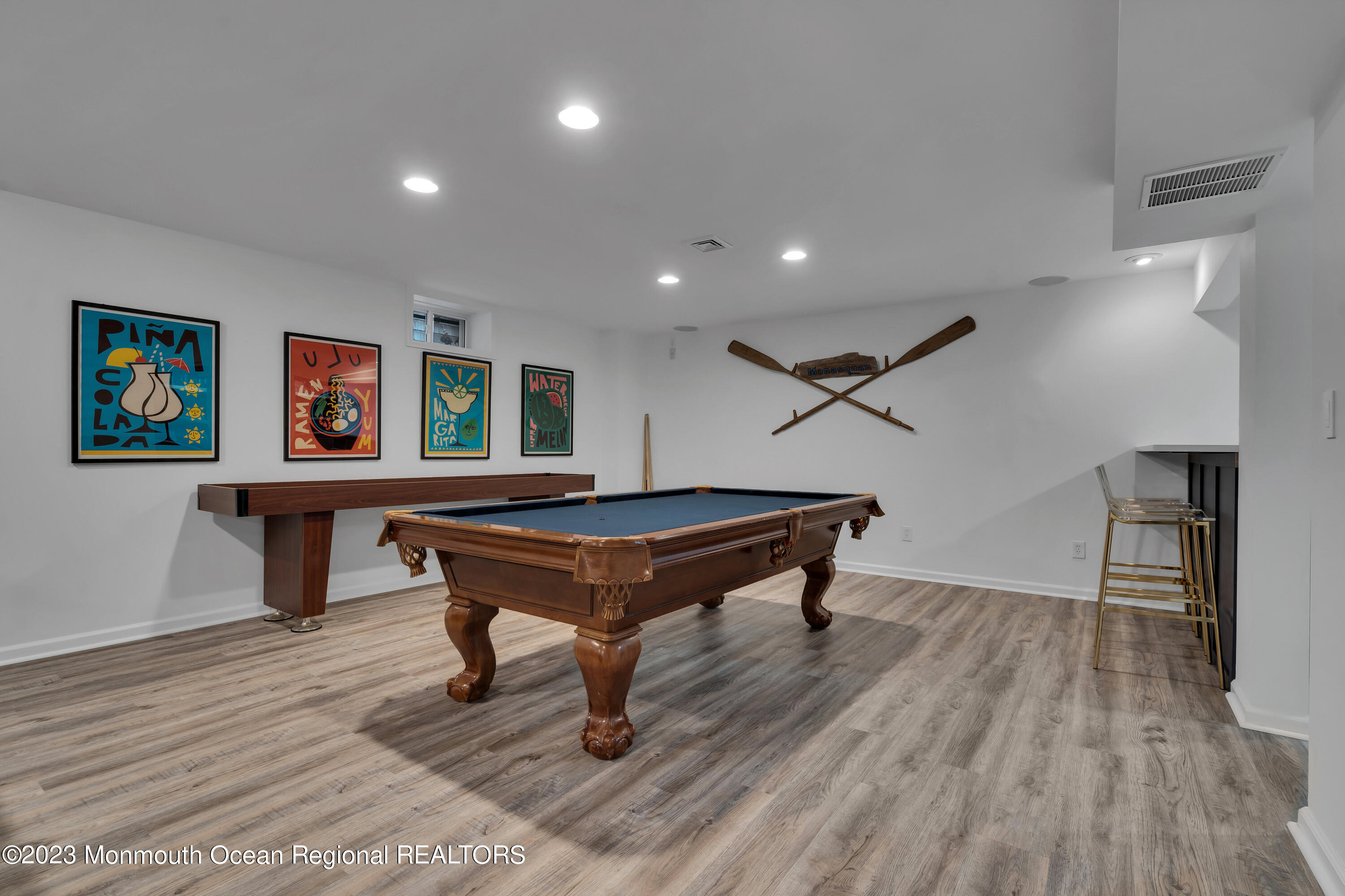 89 Mclean Avenue Manasquan, NJ 08736 - Photo 29 of 38 a room with wooden floor pool table furniture and wooden floor