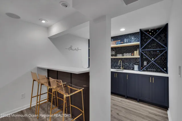 a room with cabinets and wooden floor