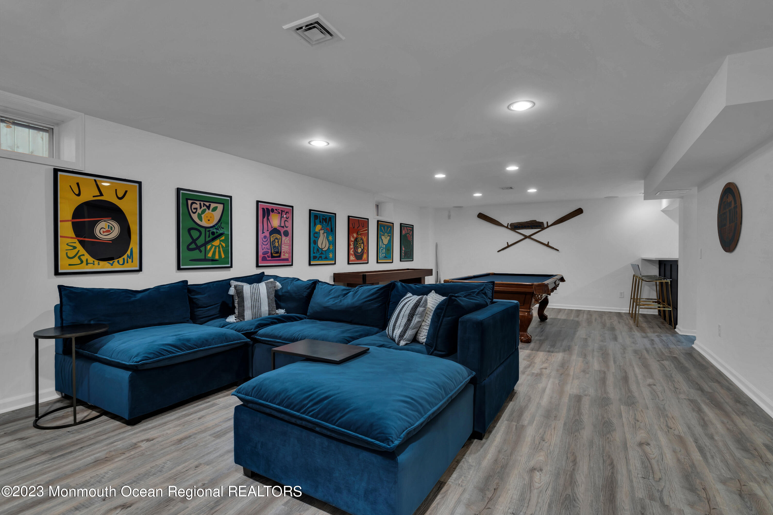 89 Mclean Avenue Manasquan, NJ 08736 - Photo 32 of 38 a living room with furniture and wooden floor