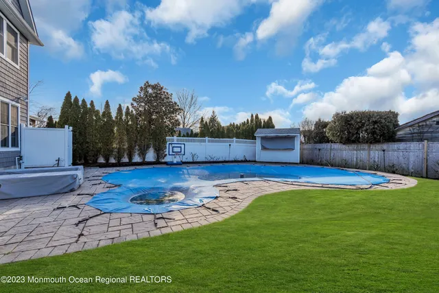 a view of a backyard with green space