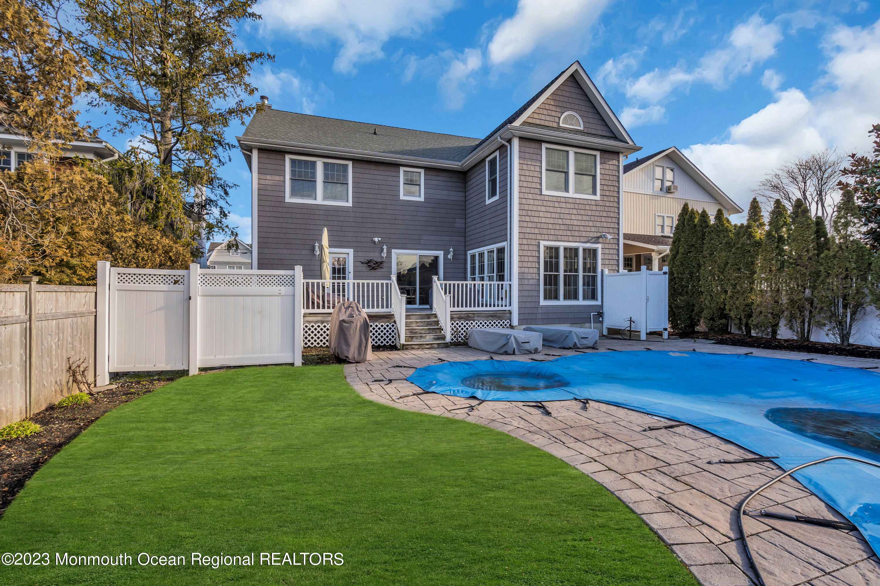 89 Mclean Avenue Manasquan, NJ 08736 - Photo 34 of 38 a front view of a house with garden