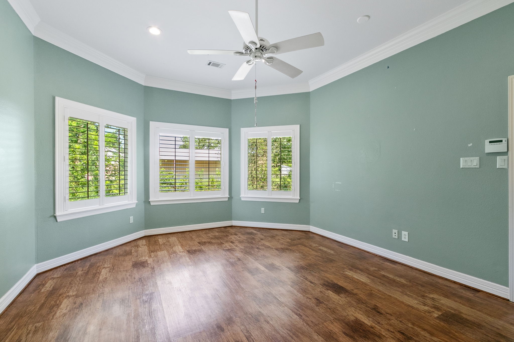 17018 Grant Road Cypress, TX 77429 - Photo 20 of 50 wooden floor in an empty room with a window