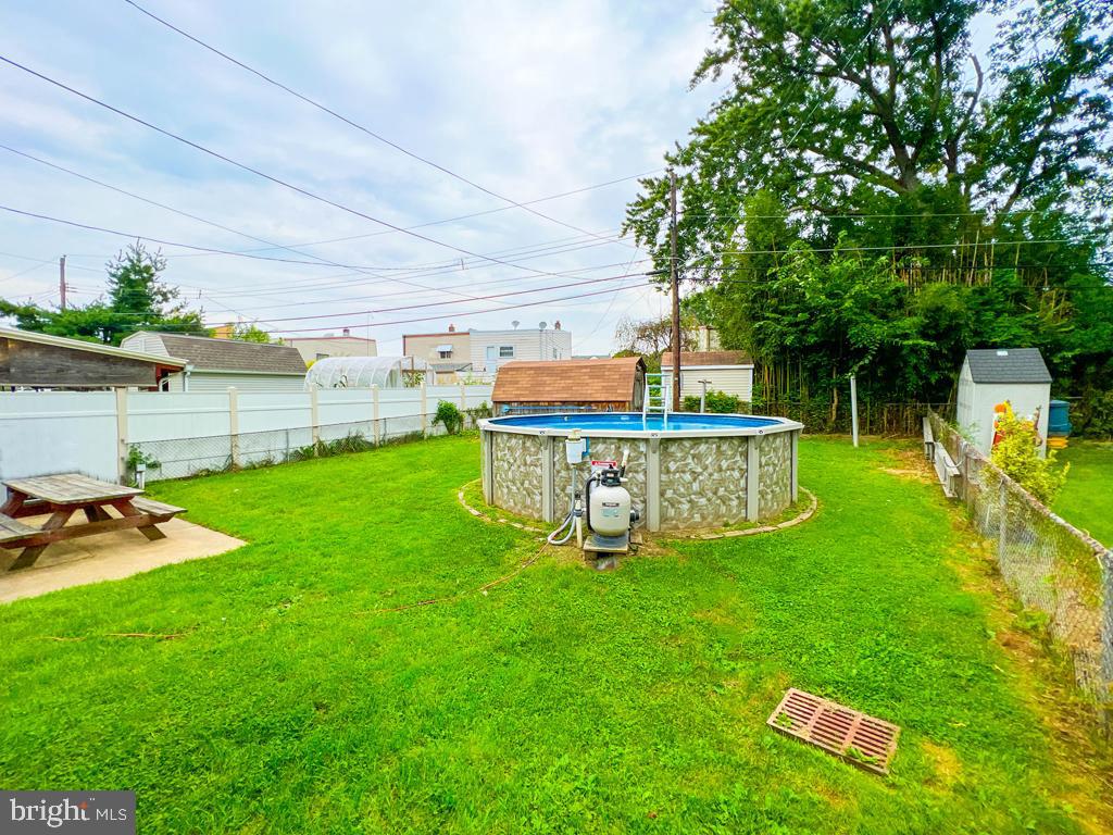 839 Avon Road Philadelphia, PA 19116 - Photo 35 of 40 Rear view of the pool and very large yard