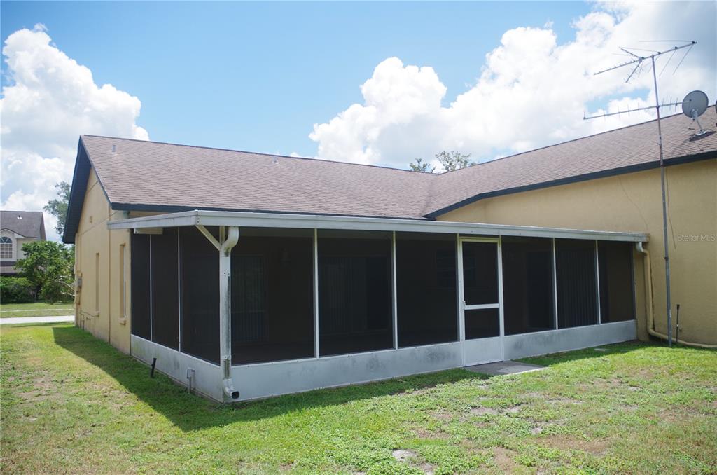 4207 Elba Place Valrico, FL 33596 - Photo 5 of 24 a view of a back yard of the house