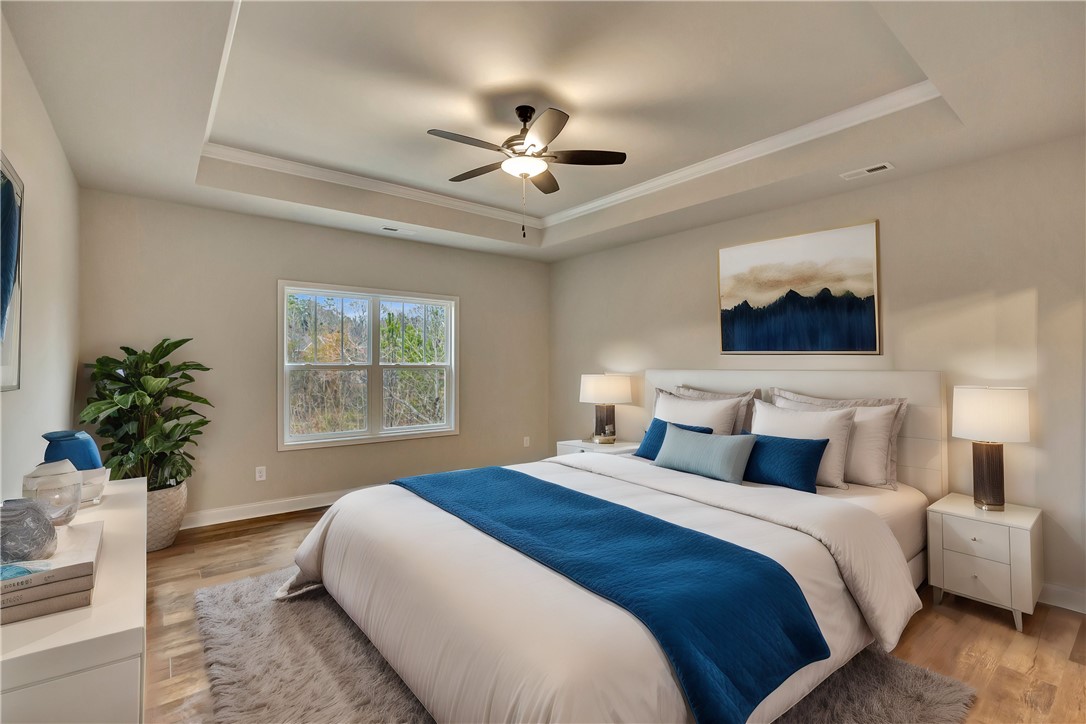 118 Bonaire Point Anderson, SC 29621 - Photo 9 of 23 This spacious room features ample natural light and elegant tray ceilings.