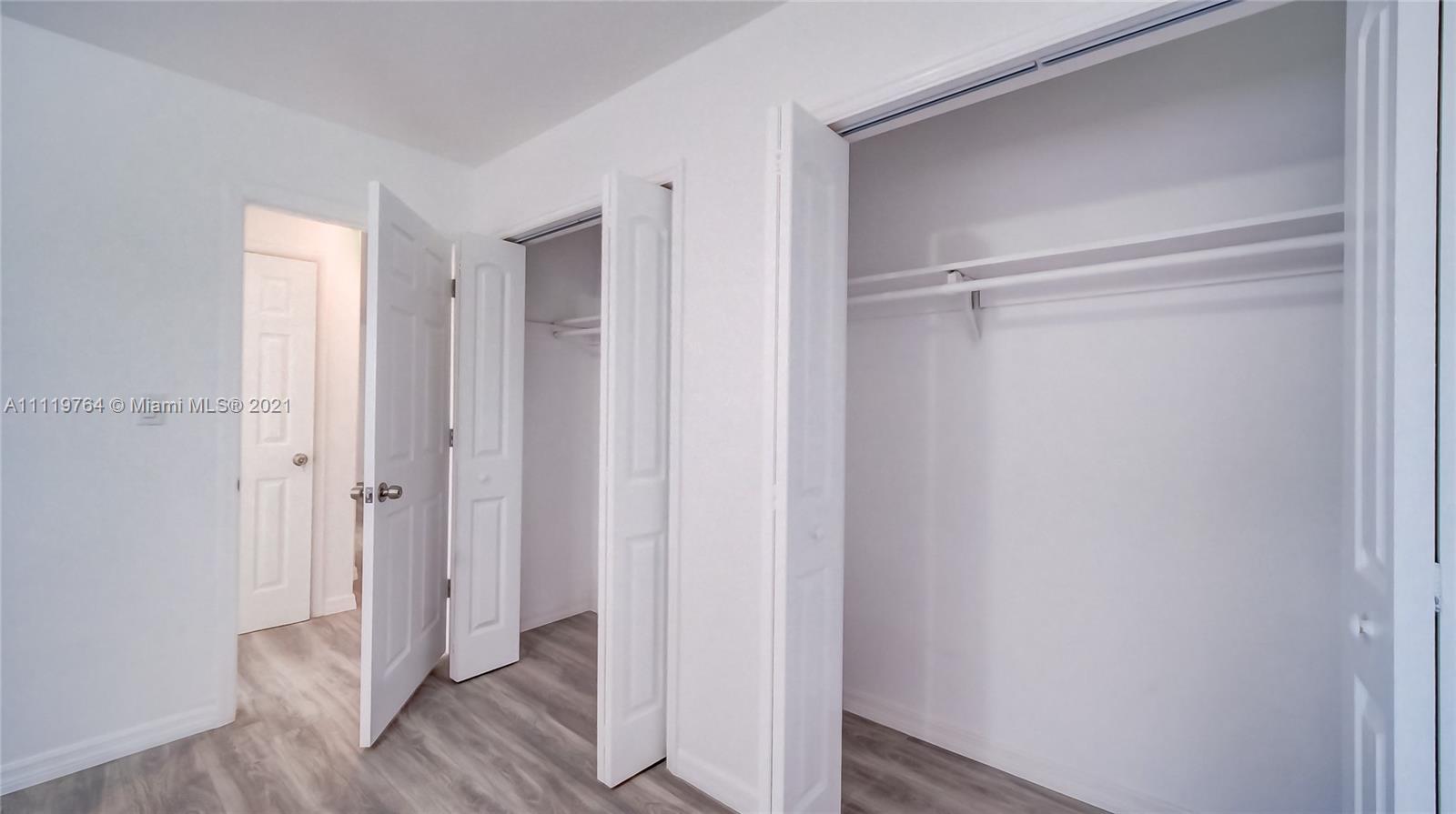 285 Northwest 97th Street Miami, FL 33150 - Photo 12 of 28 a view of a bathroom with wooden floor