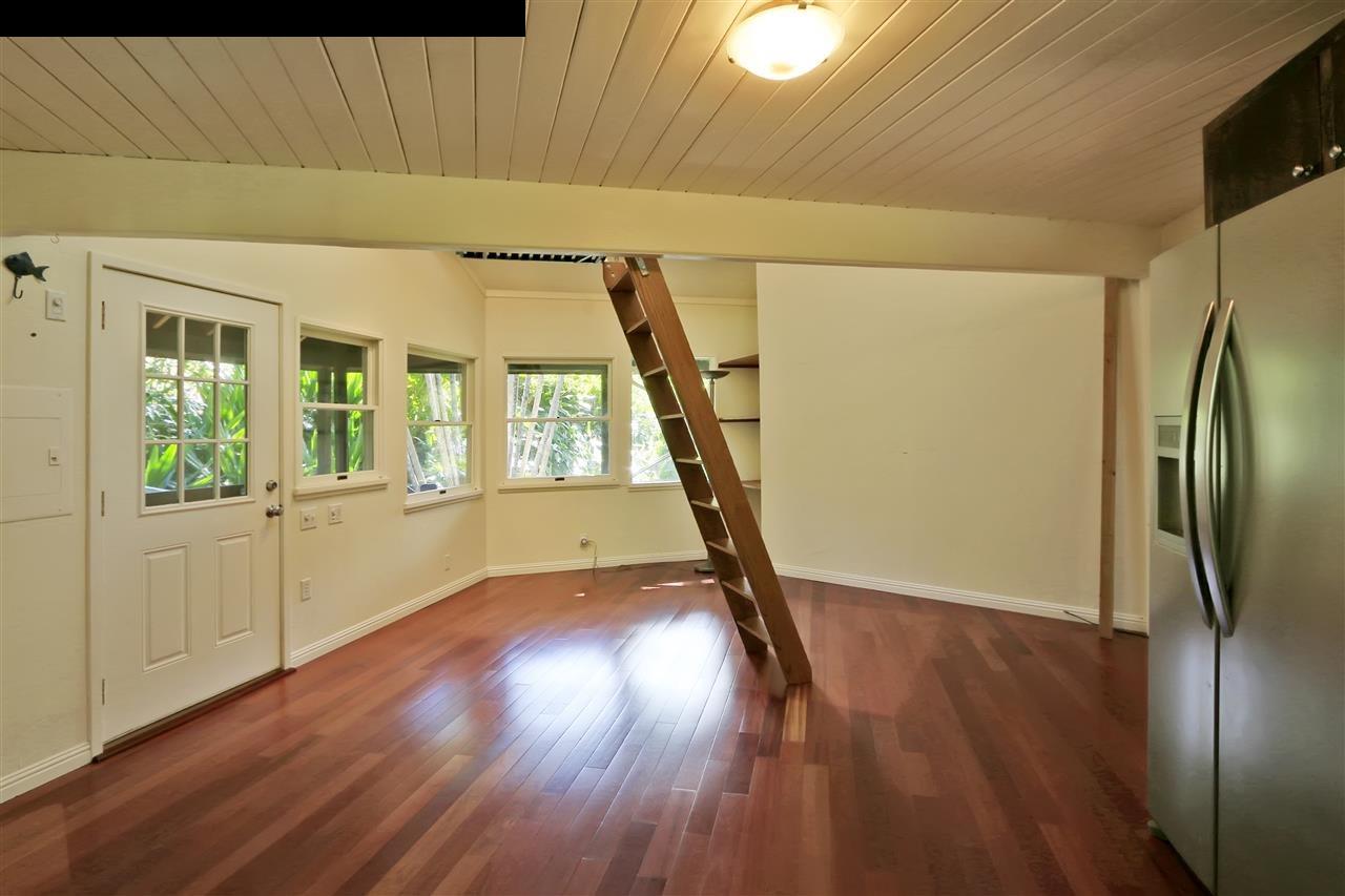 11 Kane Place Haiku, HI 96708 - Photo 13 of 30 a view of empty room with wooden floor and fan