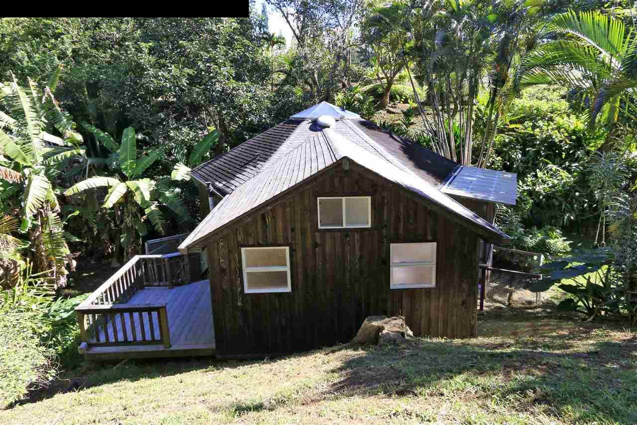 11 Kane Place Haiku, HI 96708 - Photo 5 of 30 a front view of a house with a yard