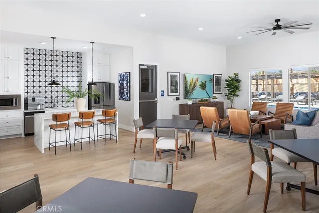 a front view of a house with a lots of windows