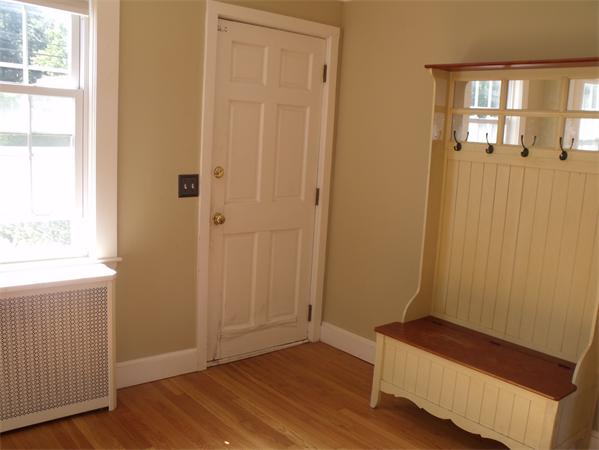 307 Harvard Road Bolton, MA 01740 - Photo 17 of 26 an empty room with wooden floor and windows