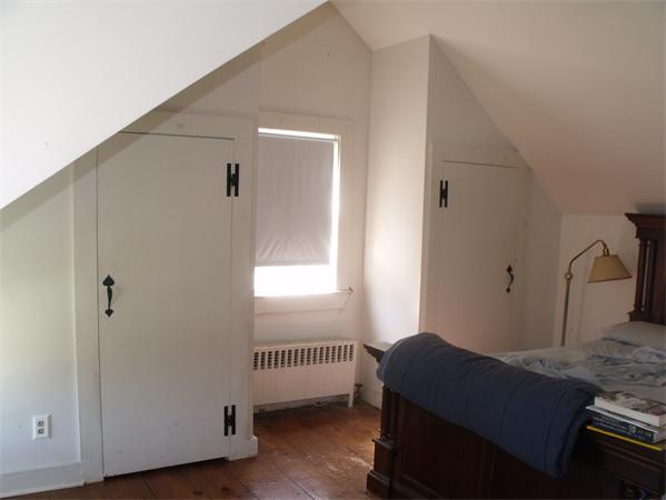 307 Harvard Road Bolton, MA 01740 - Photo 19 of 26 a bedroom with a bed and a window