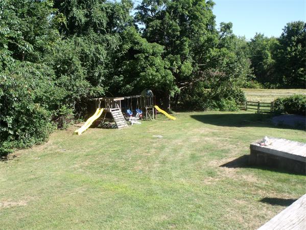 307 Harvard Road Bolton, MA 01740 - Photo 21 of 26 a view of a swimming pool with a slide
