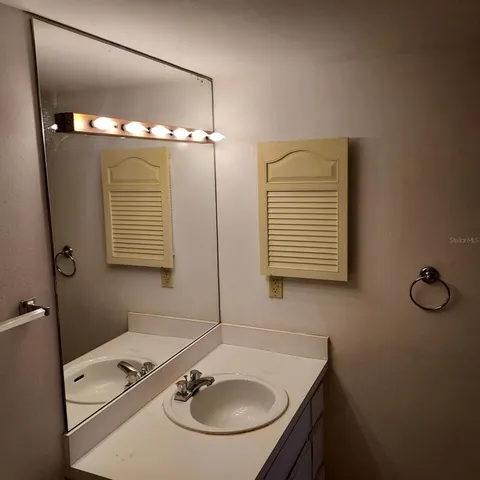 a bathroom with a bathtub and a toilet