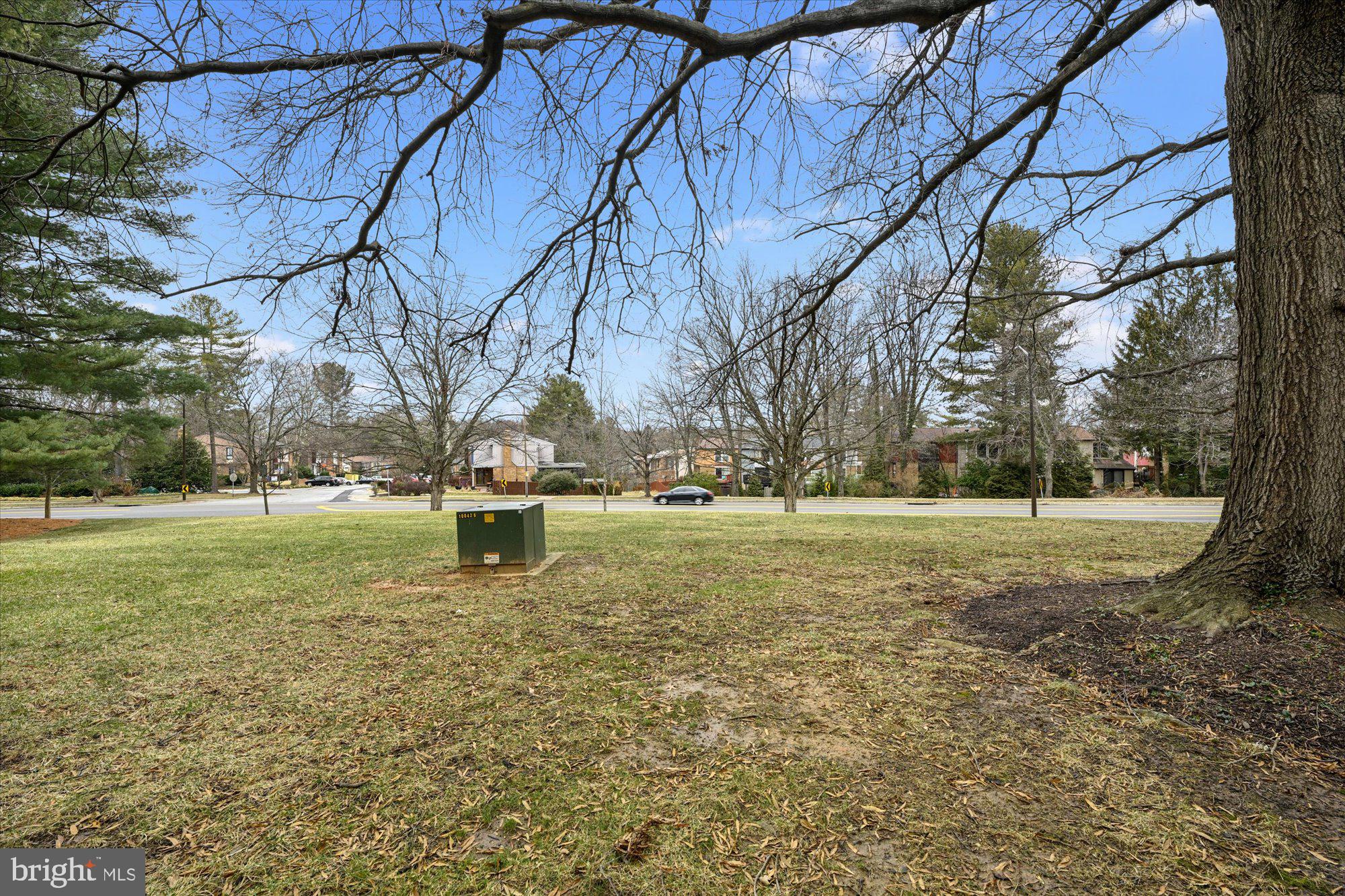 10578 Cross Fox Lane, Unit E2 Columbia, MD 21044 - Photo 2 of 28 a view of yard with trees