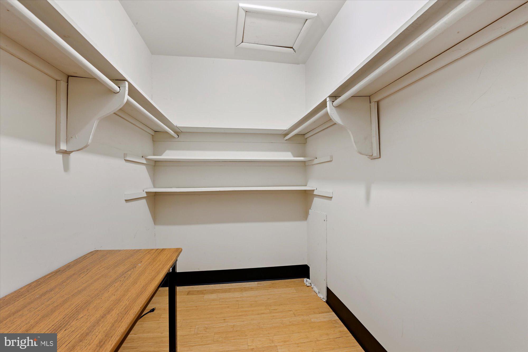10578 Cross Fox Lane, Unit E2 Columbia, MD 21044 - Photo 23 of 28 a view of a room with wooden floor